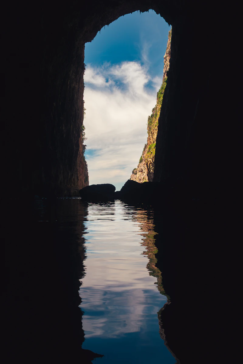 Looking out from inside Haxhi Ali sea cave on the Karaburun peninsula towards the cliffs and sky